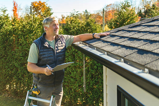 Professional Roofing technician working in Leland, IL